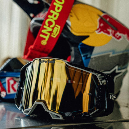 100% DUAL ARMEGA RACER PRO PACK BLACK/RED TRUE GOLD MIRROR GOGGLES