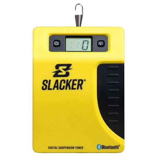 Yellow and black Slacker digital suspension tuner with a digital display screen and a hanging spring, shown on a white background.